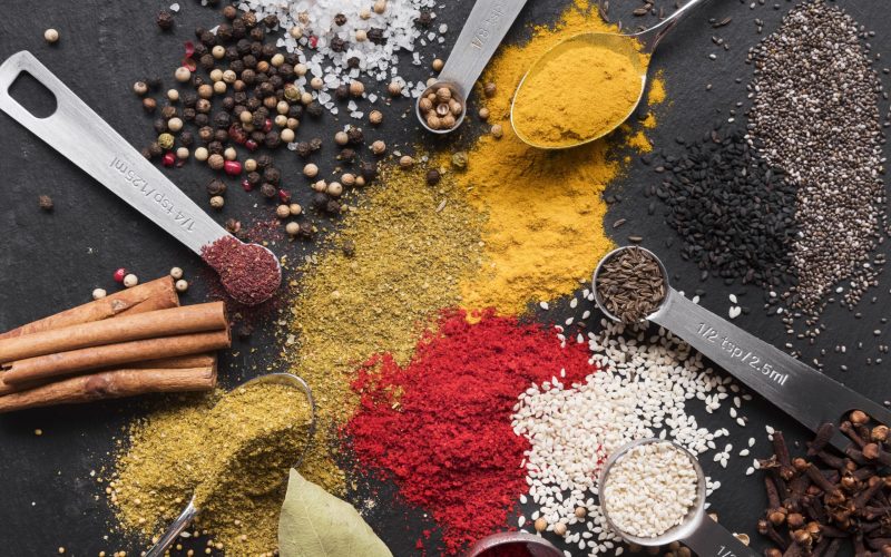 top-view-spoons-with-colorful-spices